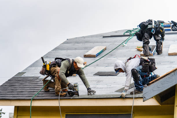 Professional Gutter Installation technician working in Inola, OK